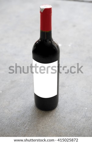 Wine bottle with blank paper generic tag