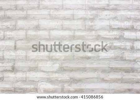 Gray and white block wall texture background / abstract wallpaper interior rock stone old pattern clean concrete grid uneven bricks design stack.
