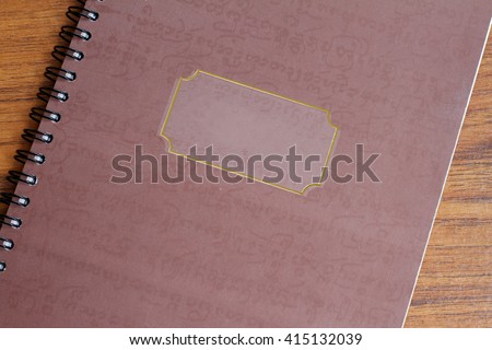 Notebook with sign
