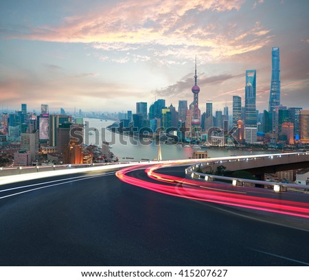 Empty road textured floor with Aerial photography bird-eye view at Shanghai bund Skyline of night scene 