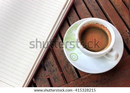 workplace, coffee cup on wooden table [blur and select focus background]