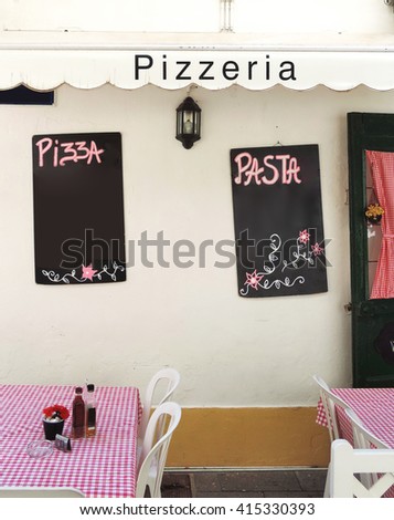 Pizzeria with blank signs