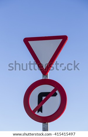 red traffic signal caution and red triangle and circle prohibition