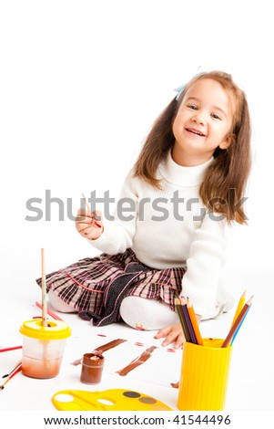 Preschool girl painting