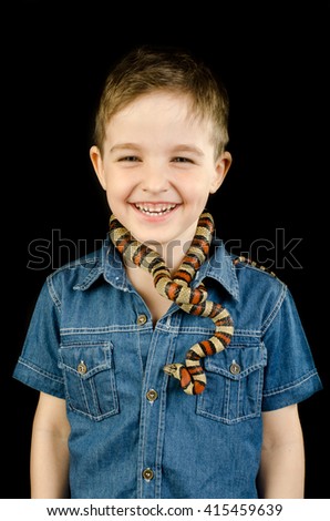 little boy and king snake