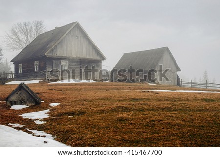 Carpathian mountain landscape with wooden farmhouse