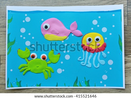 Image of sea animal by clay or plasticine on paper at kindergarten