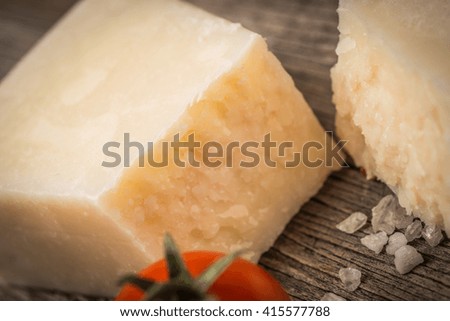 Cheese on papper  on wooden background