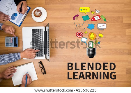 BLENDED LEARNING Business team hands at work with financial reports and a laptop Royalty-Free Stock Photo #415638223