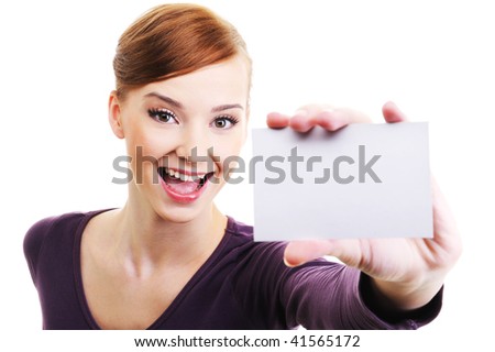 Fun and laughing beautiful female person with blank business card  in hand. High angle view