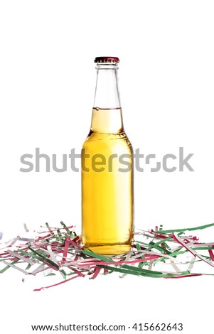 Unlabeled beers or cervesa with Cinco De Mayo holiday confetti.  The bottles are isolated on a white background.  The party confetti is made of shredded paper in the colors of the Mexico