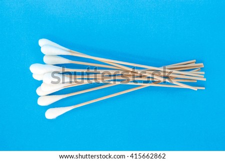 cotton bud, swab clean health care top view on blue background