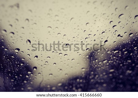 Rain dew on window car. Vintage filter