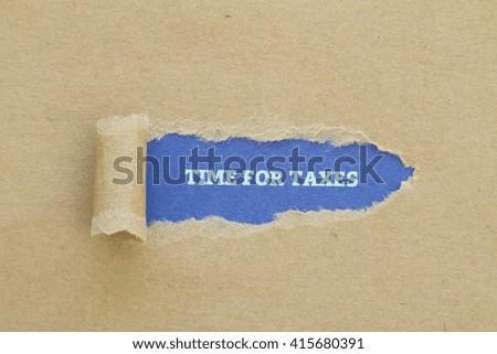 TIME FOR TAXES message written under torn paper.