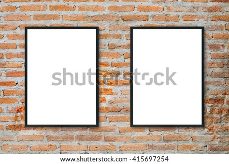 Mock up blank poster picture frame on brick wall.