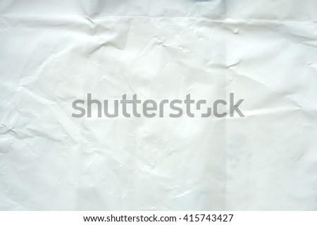 A crumpled sheet of heavy paper. White empty template
