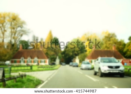 The blurry scene of car among the rural road represent the transportation concept related idea.