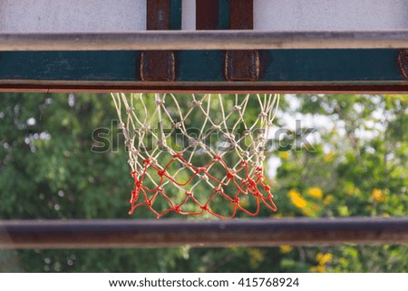 Basketball hoop make by wooden and ball in park