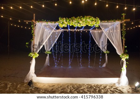 wedding arch and set up on beach Royalty-Free Stock Photo #415796338