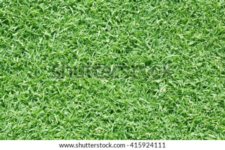 Football field green grass pattern textured background.