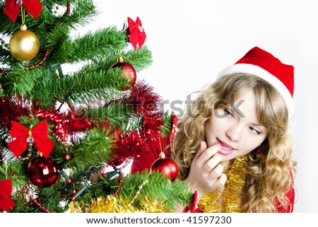 Girl at Christmas tree