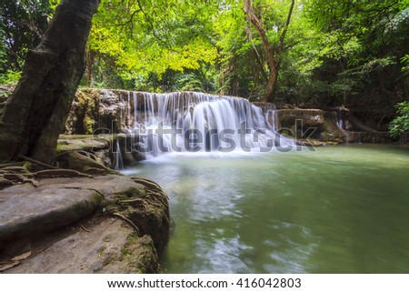 Huay Mae Kamin Waterfall, beautiful waterfall in  forest, Kanchanaburi , Thailand. Jungle landscape with flowing turquoise water at deep tropical rain forest. National Park Kanchanaburi, Thailand