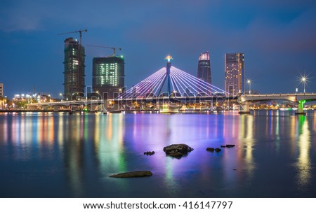 Da Nang panorama view by Han river by twilight period. Da Nang is one of the major port city in Vietnam and the biggest city in Central Vietnam