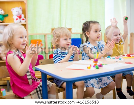 kids group learning arts and crafts in day care centre Royalty-Free Stock Photo #416156518