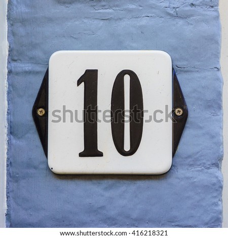 Enameled house number ten