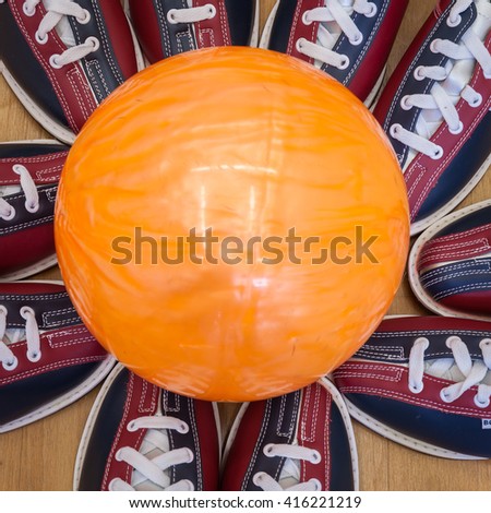 Bowling balls lined bowling shoes to celebrate victory