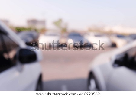 Abstract blurred background of car in parking lot,outdoor.