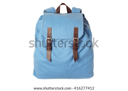 Backpack accessories isolated hipster background white. Blue with brown bag. Hand made backpack for travelers.  Royalty-Free Stock Photo #416277412