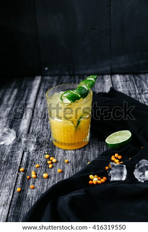 cocktail with orange and sea buckthorn