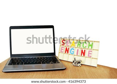 laptop and wooden word search engine  ,isolate white background