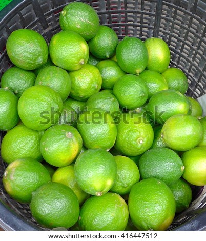 Fresh limes closeup in the basket