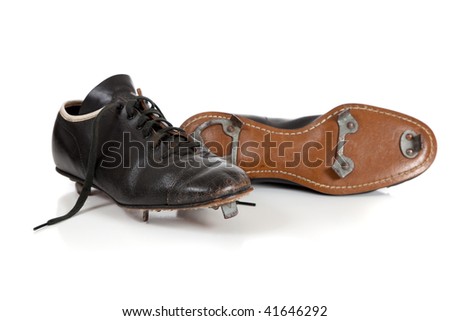A pair of baseball cleats on a white background