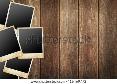 photo frames on wood background