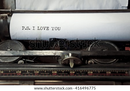 close up image of typewriter with paper sheet and the phrase: p.s. i love you. copy space for your text. retro filtered 