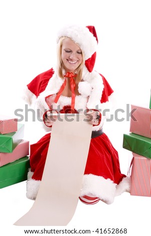 Santa's helper sitting by the presents looking at the naughty nice list smiling.