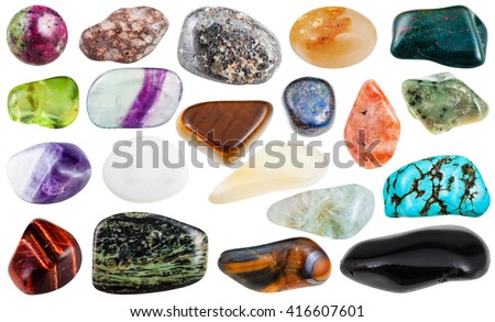 set of various polished natural mineral stones and gemstones - sunstone, azurite, chessylite, moonstone, grossular, chrysolite, prasiolite, fluorite, bloodstone, etc isolated on white background