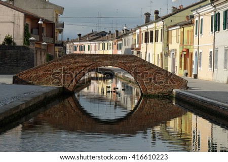 comacchio reflected in the famous lagoon city channels eel farming