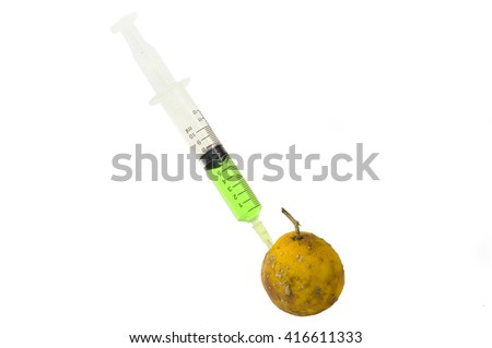 Syringe in a lemon dry on a white background,Green