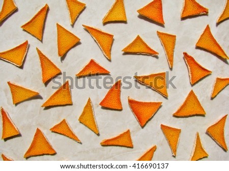 Abstract composition of orange peel pieces
