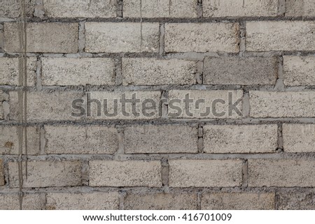 neat cement brick wall with vertical row cement line on the left Royalty-Free Stock Photo #416701009
