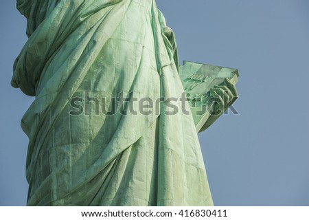Majestic iconic lady liberty statue of liberty in New York harbor welcoming new arrivals