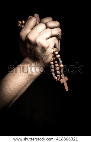 Man hands in prayer. 
