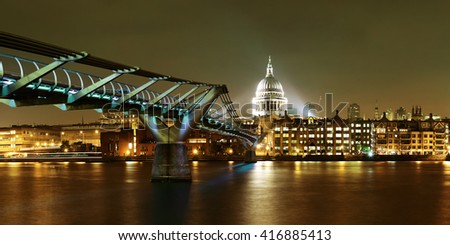 Millennium Bridge and St Pauls Cathedral at night in London