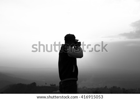 photographer silhouette at sunset
