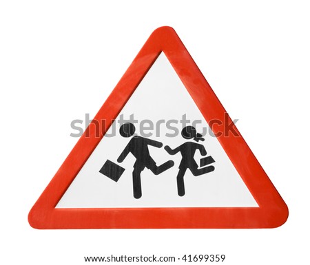 Warning sign with school children running and playing