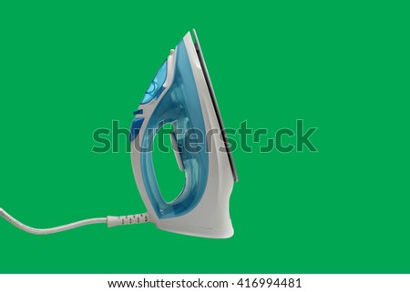 iron housework ironed electric tool clean isolated on green.